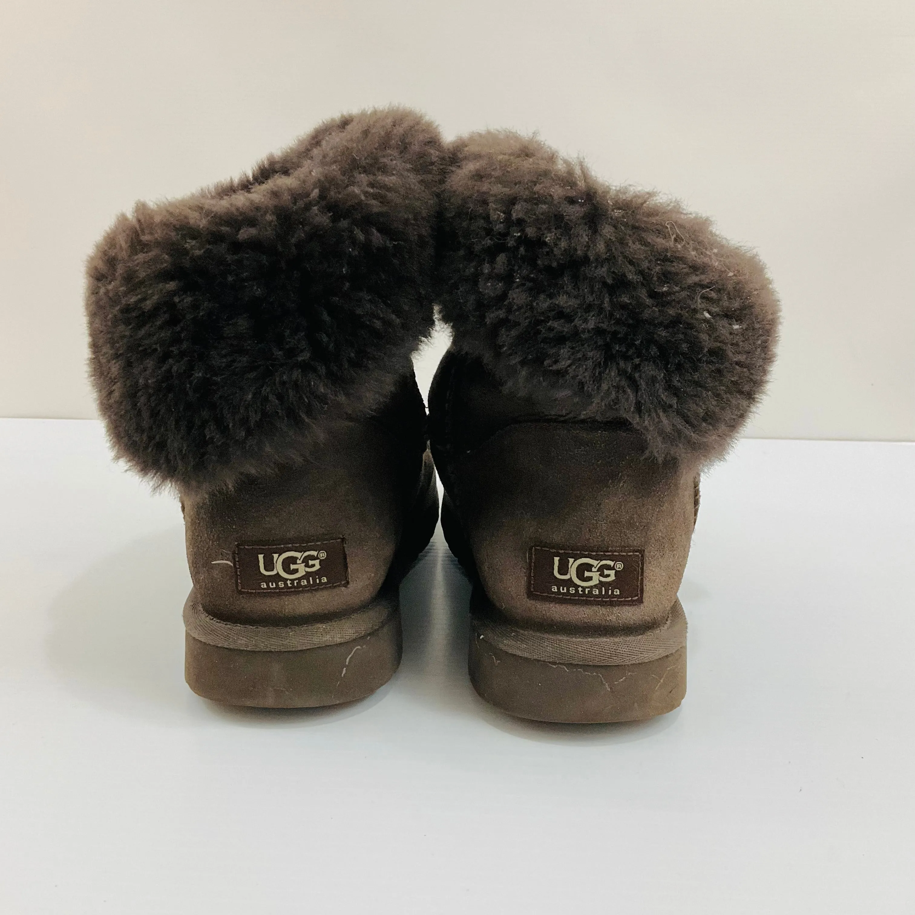 Boots Designer By Ugg In Brown, Size: 10